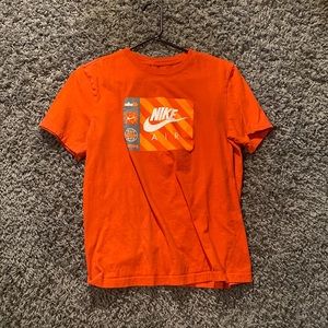 Red Nike graphic tee